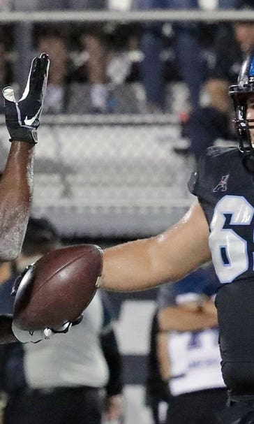 No. 9 UCF improves to 8-0 with 52-40 takedown of Temple